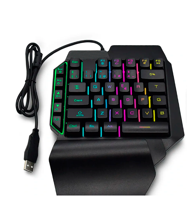 teclado gamer negro con retroiluminación led rgb en colores arcoíris resaltando las teclas mecánicas sobre un escritorio oscuro profesional